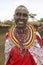 Masai female in robe with beads in village near Tsavo National Park, Kenya, Africa