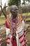 Masai female in robe with beads in village near Tsavo National Park, Kenya, Africa