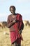 Masai herdsman minding his cattle near Nairobi National Park in Kenya, Africa