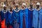 Masai or Maasai tribe woman in blue cloth wearing headpiece and ornaments. Ethnic group of Ngorongoro Consevation, Serengeti in