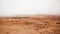 Masai or Maasai Village in empty golden grass plain. Ngorongoro Consevation, Serengeti Savanna forest in Tanzania