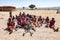 Masai People, Women and Children of Maasai Tribe sitting on ground, Tanzania, Africa