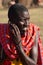 Masai tribesman shows off earlobe hole