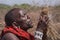 Masai warrior making fire