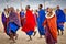 Masai warriors dancing traditional jumps as cultural ceremony, T