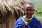 Masai Woman wearing her traditional dress and accessories