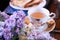 Masala chai tea of india with bread, butter and lilac flower