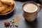 Masala pulled tea chai latte traditional hot Indian sweet milk spiced drink, ginger,