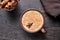 Masala tea chai latte traditional warm Indian sweet milk spiced drink, ginger, cinammon sticks, fresh spices blend