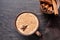 Masala tea chai latte traditional warm Indian sweet milk spiced drink, ginger, cinammon sticks, spices blend organic