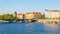 Masaryk Embankment with and Sitkovska water tower Palacky Bridge over Vltava River in Prague city centre, Czech Republic