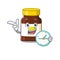 Mascot design style of bottle vitamin c standing with holding a clock