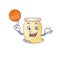 A mascot picture of cashew butter cartoon character playing basketball