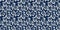 Masculine indigo floral blockprint linen seamless border. All over print of navy blue cotton effect flower linocut
