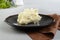 Mashed potato on grey plate