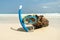 Mask and snorkel in the surf on the sandy beach