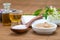 Mask white bowl, essential oil, salt spoon and towel, flower ba