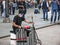 Masked anonymous percussionist performs in Duomo square Milan