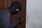 Masked burglar with balaclava entering and breaking into a house at night time. Crime concept.