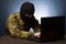 Masked cyber terrorist hacking army intelligence