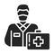 Masked doctor man with a suitcase black glyph icon. Coronavirus prevention. Emergency. Pictogram for web page, mobile