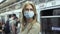 Masked face woman carriage subway coronavirus. Crowd passengers train covid-19.