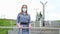 Masked girl in a public place in the city. protection against viruses and epidemiccovid-19. pandemic in China and the