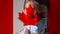 Masked man on the background of the flag of Canada. The epidemic, the dangerous virus of the crown of 2020. Infection and mass