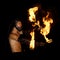 Masked Man Spins Fire at Goa Juggling Festival