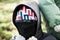 Masket person with sunglasses and hood