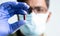 Maski, India - October,16, 2022 : Close up of doctor holding molnupiravir antiviral drug against coronavirus covid 19 outbreak