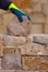 Mason hands working on masonry stone wall