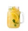 Mason jar of orange refreshing drink with mint