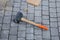 Mason tool for curb stone and brick pavement laying down, rubber mallet. rubber hammer for tile