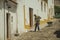 Mason working in front of house in street of Evoramonte