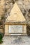 Masonic symbol Eye of Providence inside triangle, on headstone. Malta,Mediterranean
