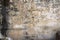 Masonry castle wall stone grunge texture. Grungy vintage fortress granite and sandstone. Rough old stone or rock of mountains