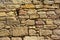 Masonry construction of medieval fortress wall made of limestone