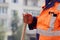 masons in the town square laid paving slabs. worker stands with a shovel