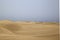 Maspalomas sand dunes panoramic view. Empty dunes landscape with no people walking on the background