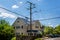 Mass of overhead power cables meeting at street junction in Middleburg, Virginia, USA