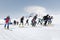 Mass start race, ski mountaineers climb on skis on mountain. Team Race ski mountaineering. Russia, Kamchatka
