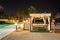 The massage beds on the beach in night illumination