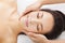 Massage of face for woman in spa