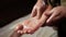 Massage of human foot in spa salon