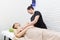 Massage session in beauty salon, forearm and shoulder massage