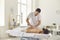 Massage session in medical clinic from professional doctor masseur