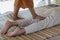 Massage style Thai old culture by hands and foot knead on body for relax muscle