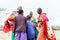 Massai family celebrating and dancing