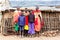 Massai family looking in camera